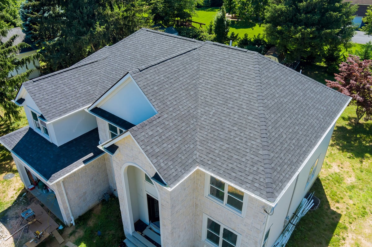 Completed roof replacement with new asphalt shingles