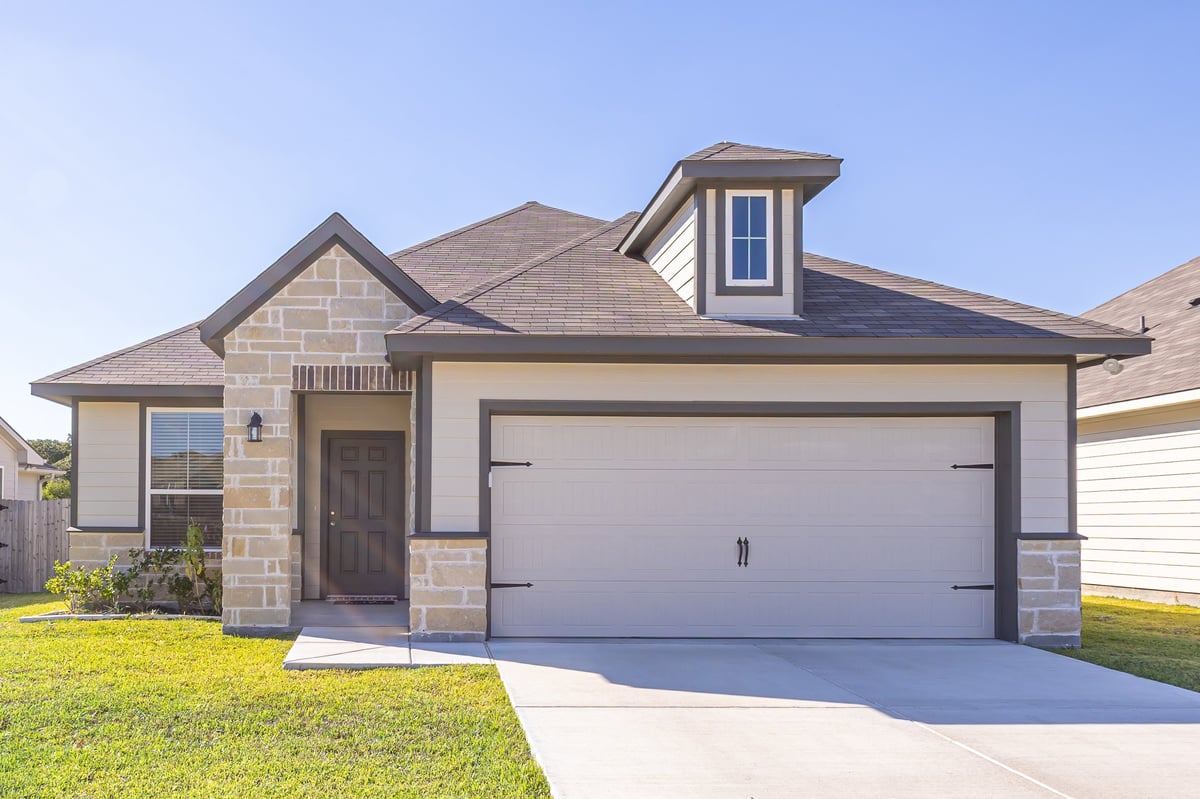 Suburban home with completed roof and siding work
